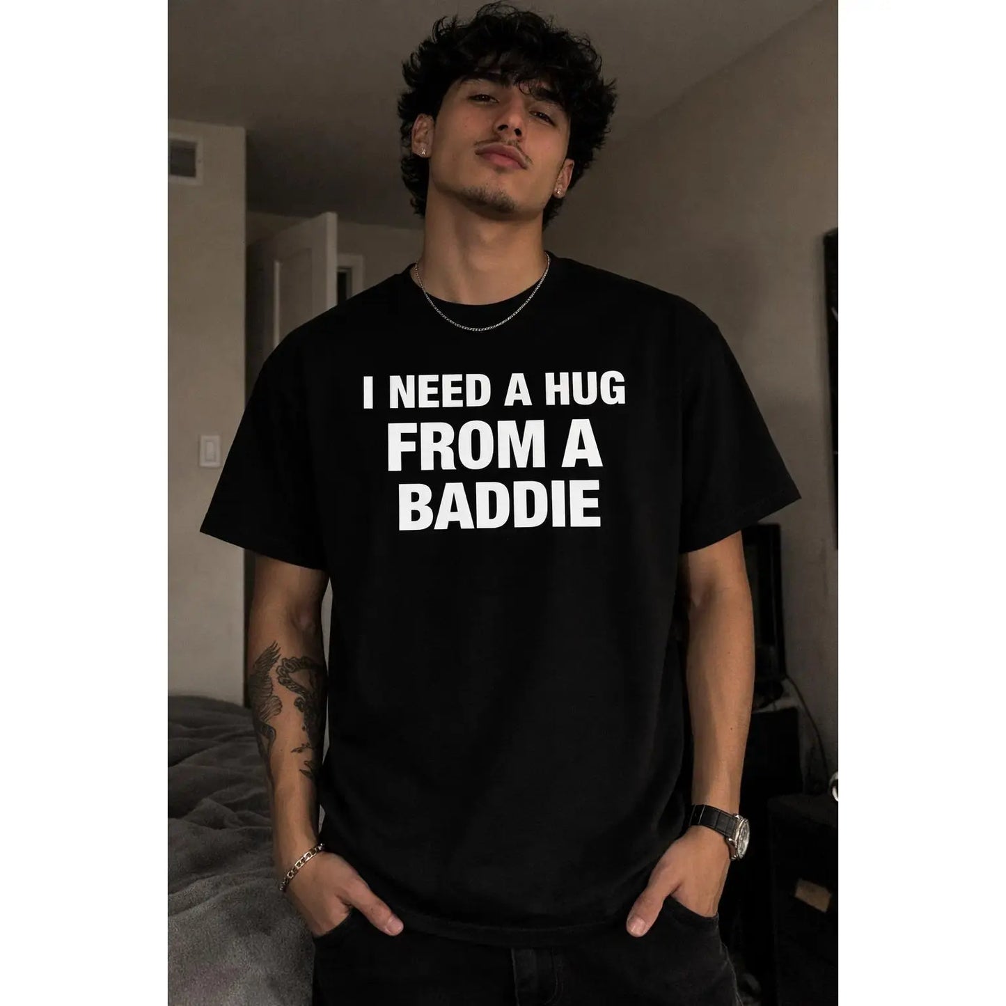 I need a T-shirt with the "Bad Guy Hug" printed on it, a versatile short sleeve, and a loose fit